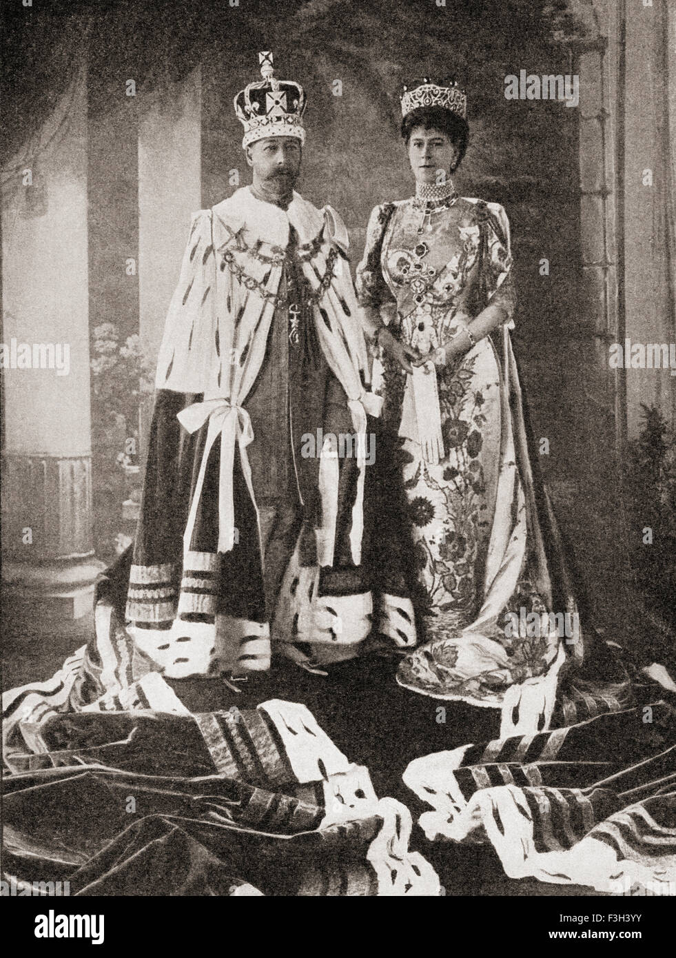 King George V and Queen Mary in their state robes after the coronation ceremony in 1911.  George V,  1865 – 1936.   King of the United Kingdom and the British Dominions,  and Emperor of India, 1910 - 1936.  Mary of Teck, 1867 – 1953.  Queen consort of the United Kingdom and the British Dominions, and Empress consort of India. Stock Photo