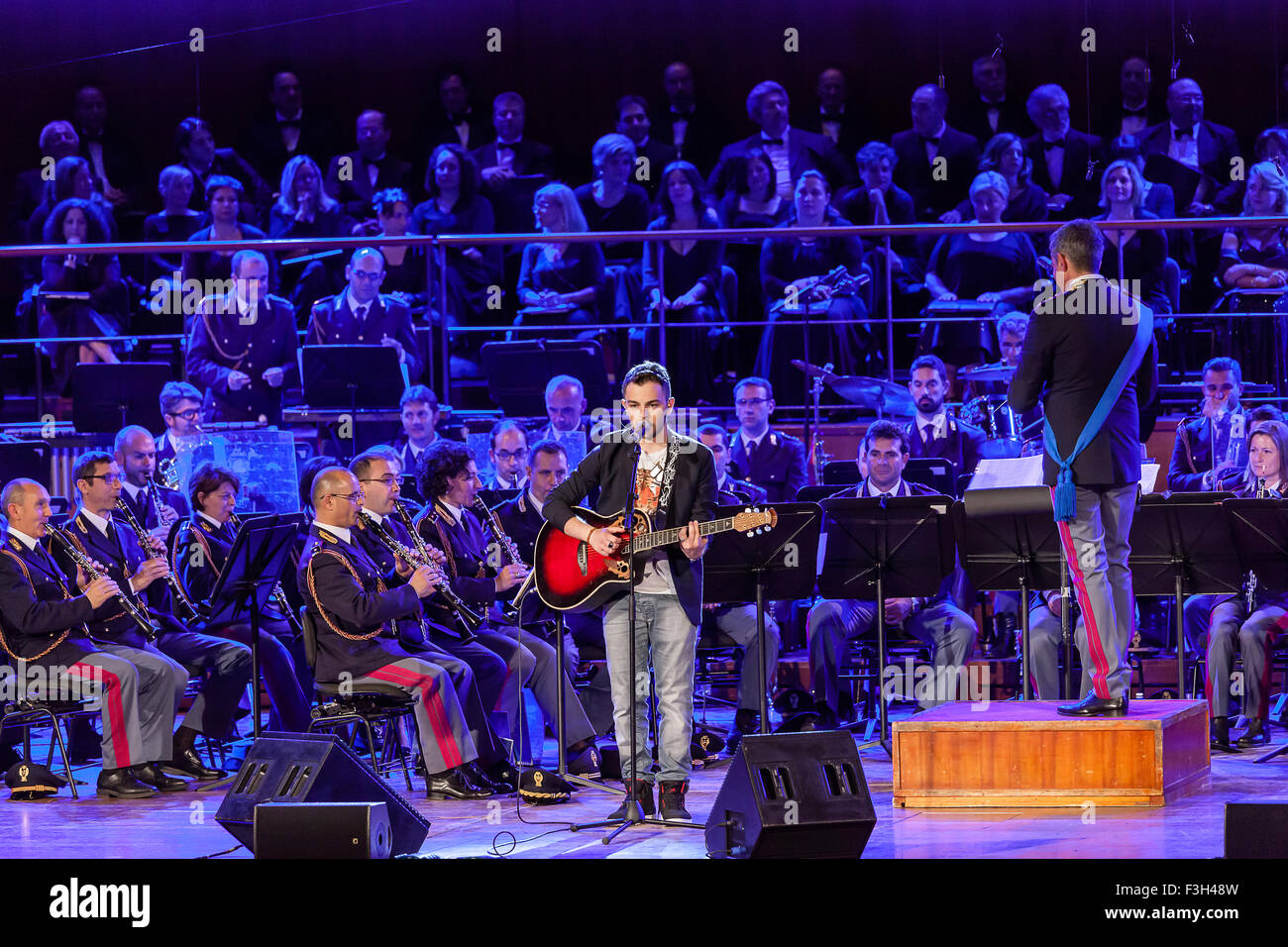 Rome, Italy - May 6, 2015: Lorenzo Fragola, sings in the concert of the Band of the State Police. Stock Photo