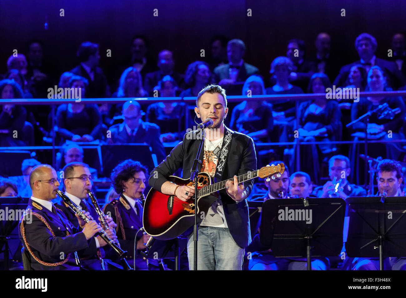 Rome, Italy - May 6, 2015: Lorenzo Fragola, sings in the concert of the Band of the State Police. Stock Photo