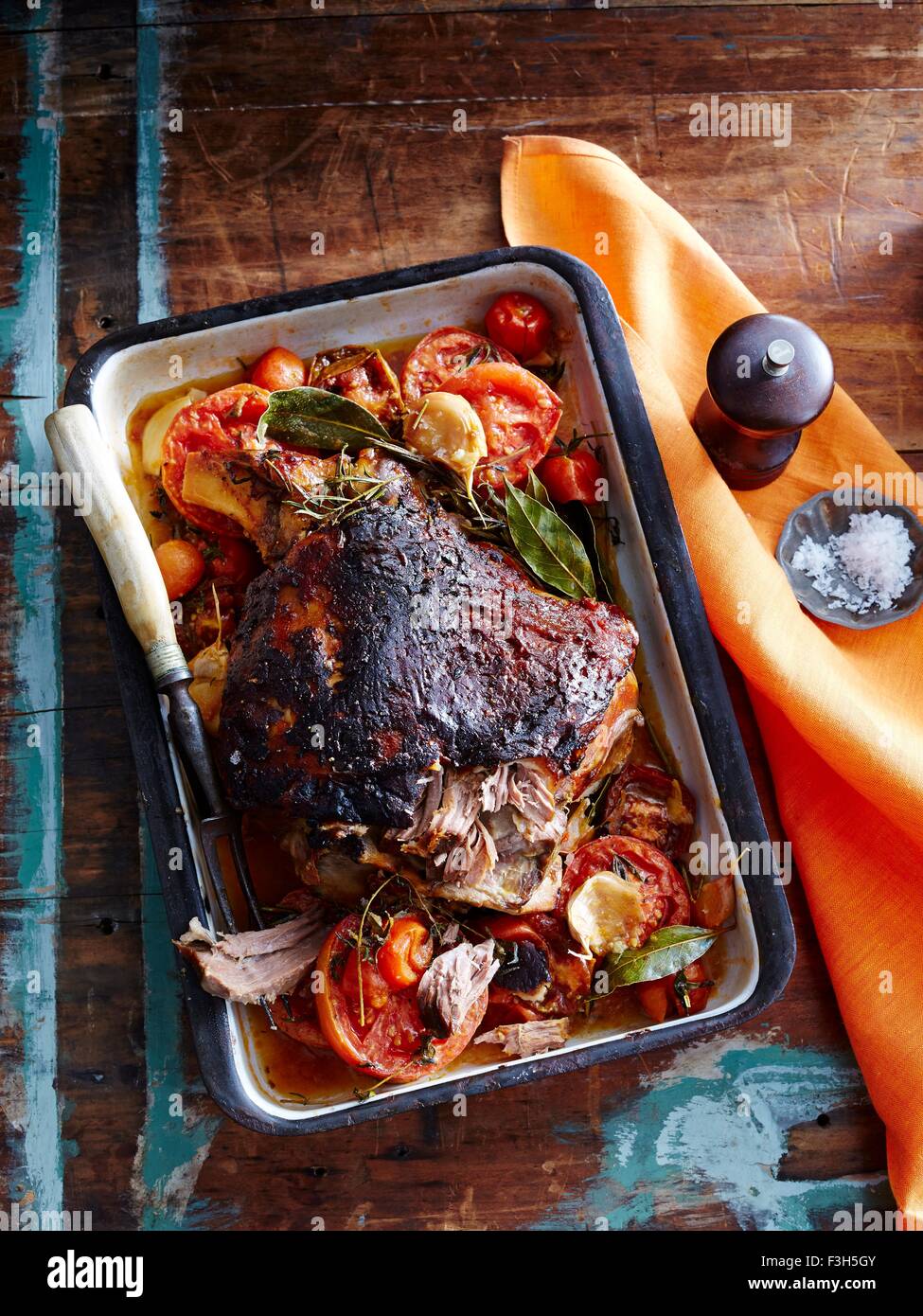 Slow roasted lamb with tomato and garlic crust Stock Photo