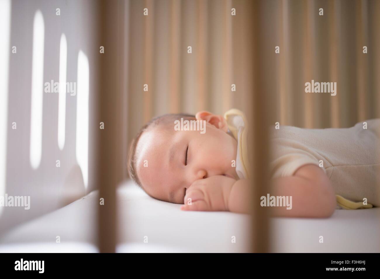 Asian boy sleeping in bed hires stock photography and images Alamy