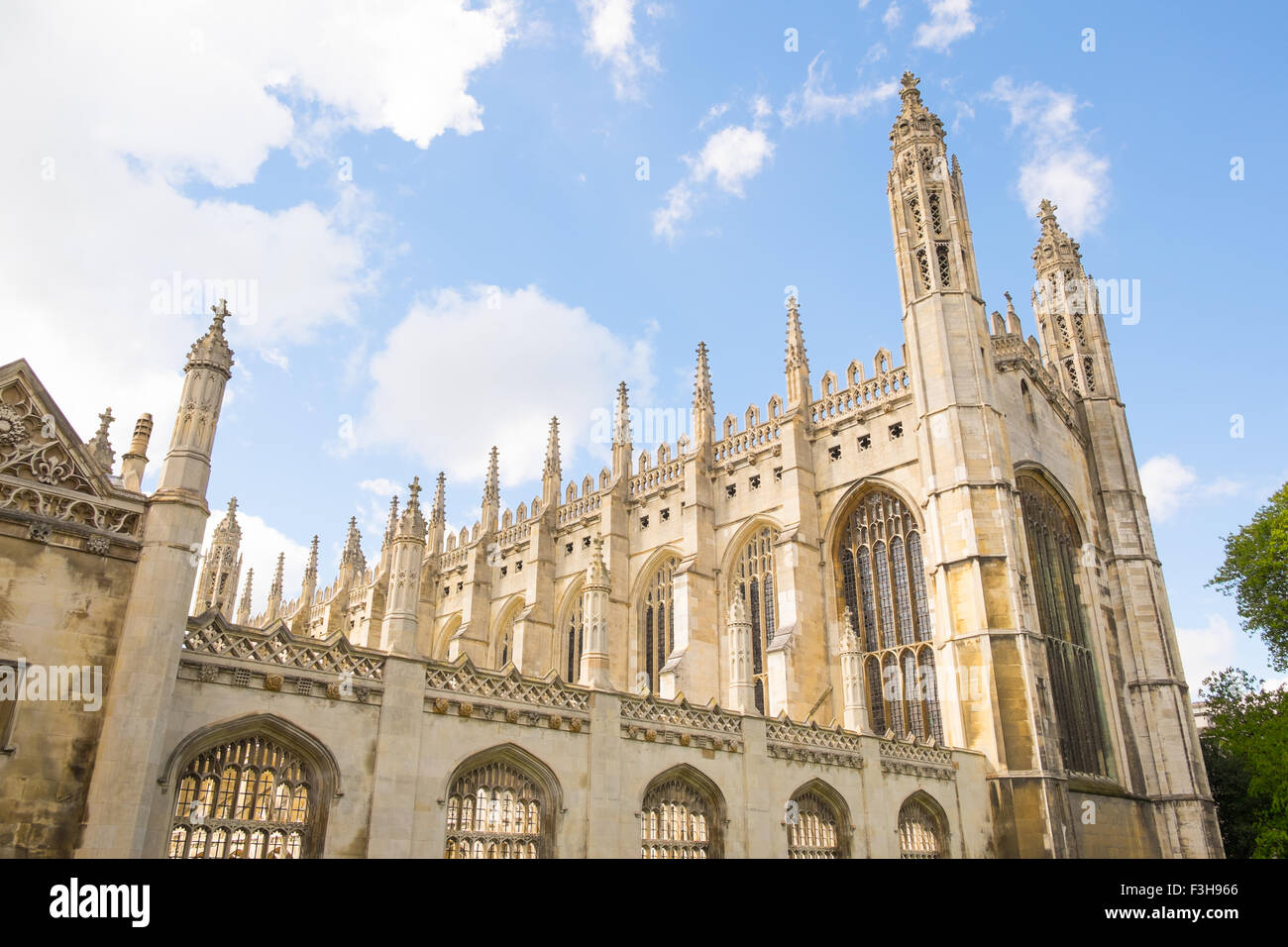 Kings college Cambridge with blue sky and stripped lawn view from kings parade Stock Photo