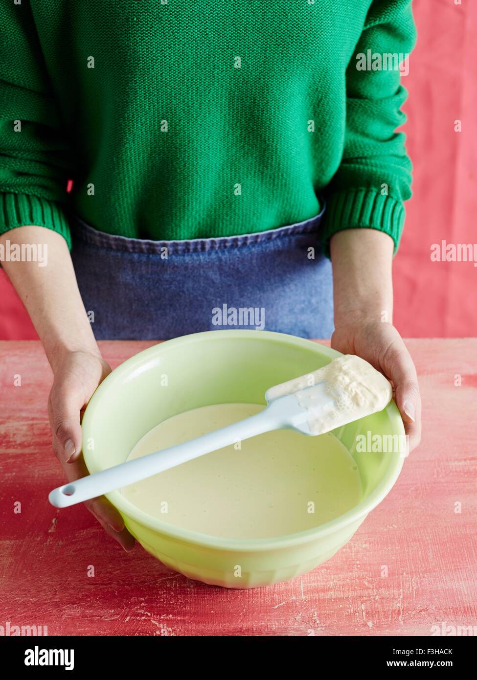 Person making butter Stock Photo