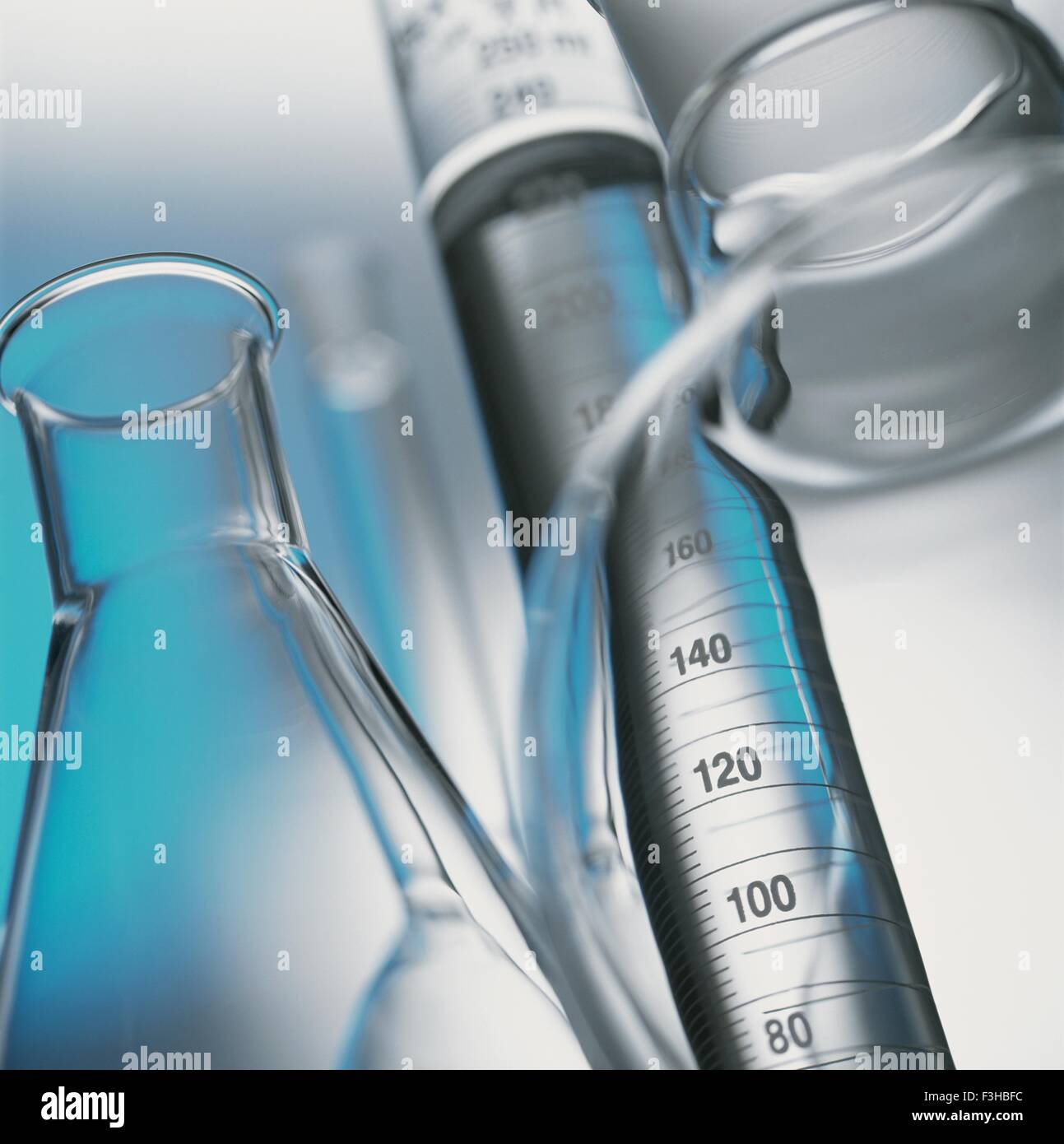Volumetric laboratory glassware used in a chemistry lab, close-up Stock Photo