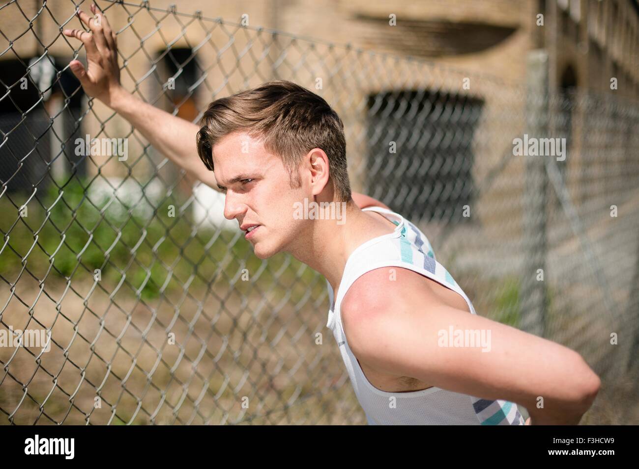 Man stretching arms behind back High Resolution Stock Photography and ...