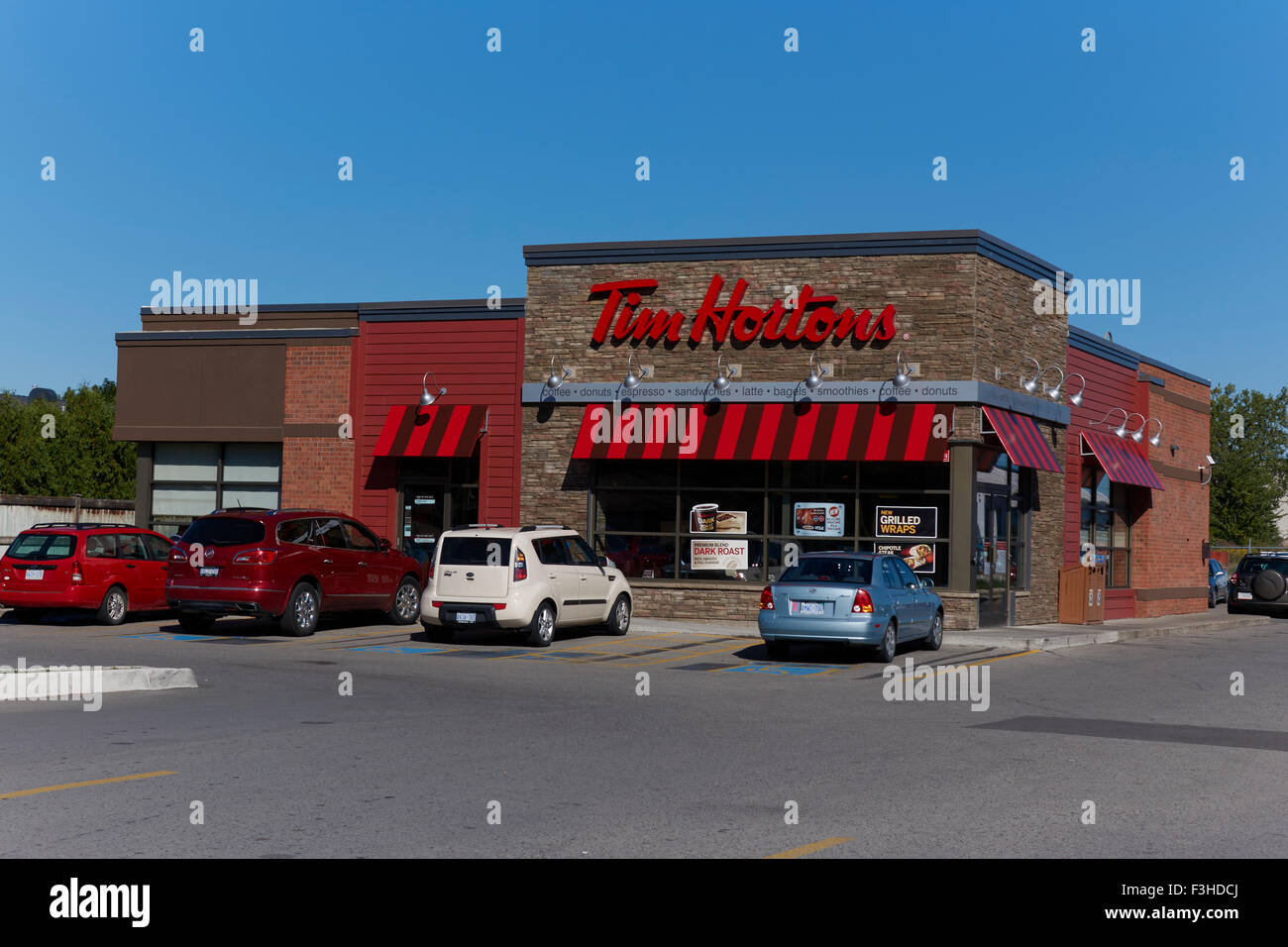 Tim Horton Coffee Shop Sign On The Outside Of A New Corporate Design For The Donut And Sandwich Chain Of Restaurants In Canada Stock Photo