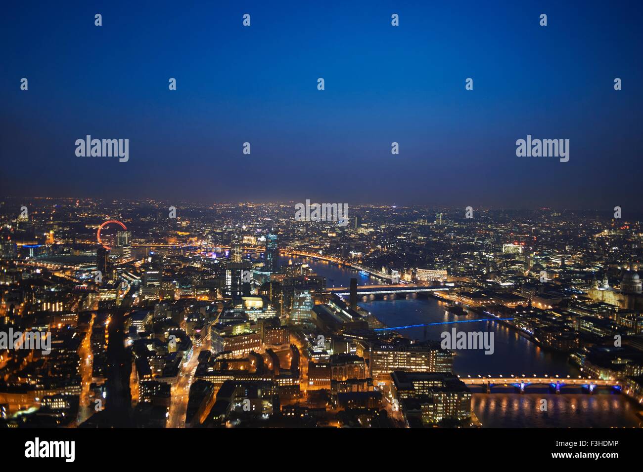 Aerial cityscape of river Thames at night, London, England, UK Stock Photo