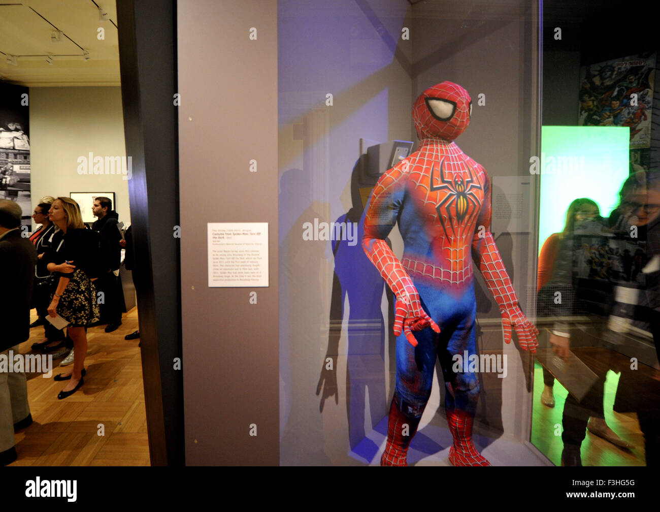 New York, USA. 7th Oct, 2015. Media representatives visit the preview of the exhibition "Superheroes in Gotham", at New York Historical Society, in New York, the United States, on Oct. 7, 2015. On view from Oct. 9 through Feb. 21, 2016, "Superheroes in Gotham" will focus on American culture's most legendary superheroes - Superman, Batman, Wonder Woman, Captain America, Spider-Man and Iron Man - as well as more recent characters inspired by the contemporary city. © Wang Lei/Xinhua/Alamy Live News Stock Photo