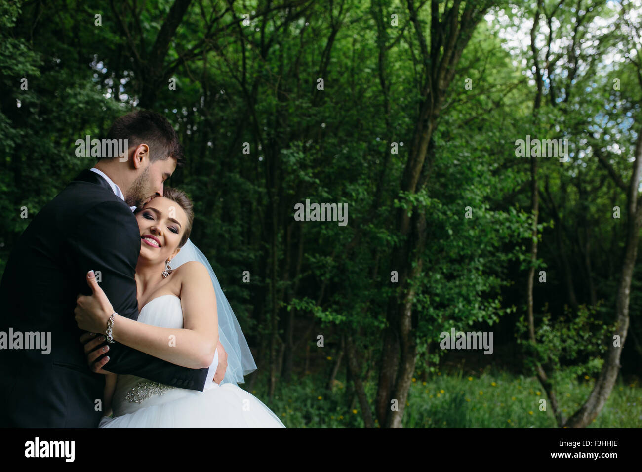 Marryed Beautiful wedding couple on nature Stock Photo - Alamy