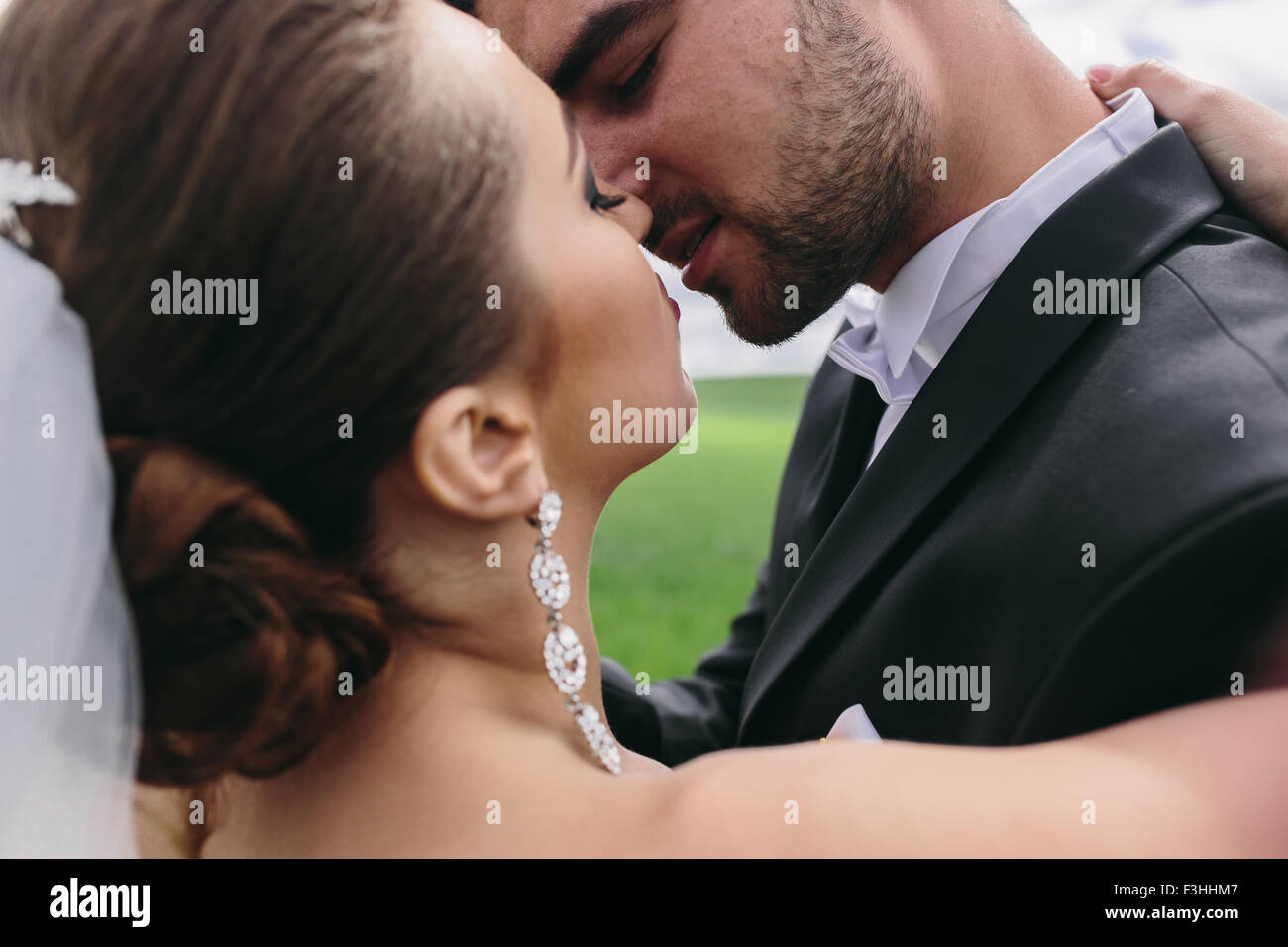 Beautiful wedding couple on nature Stock Photo - Alamy