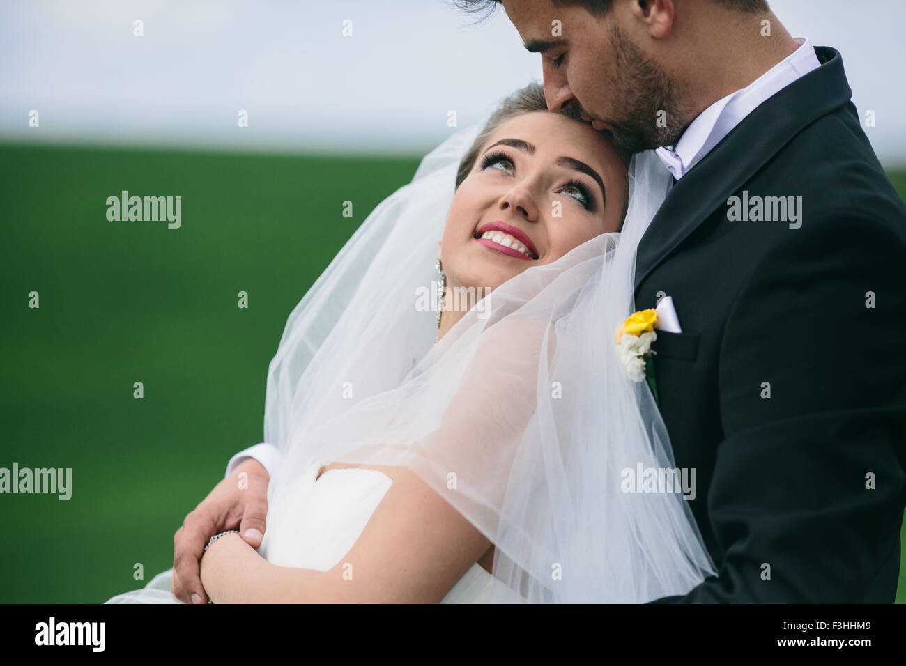 Beautiful wedding couple on nature Stock Photo - Alamy