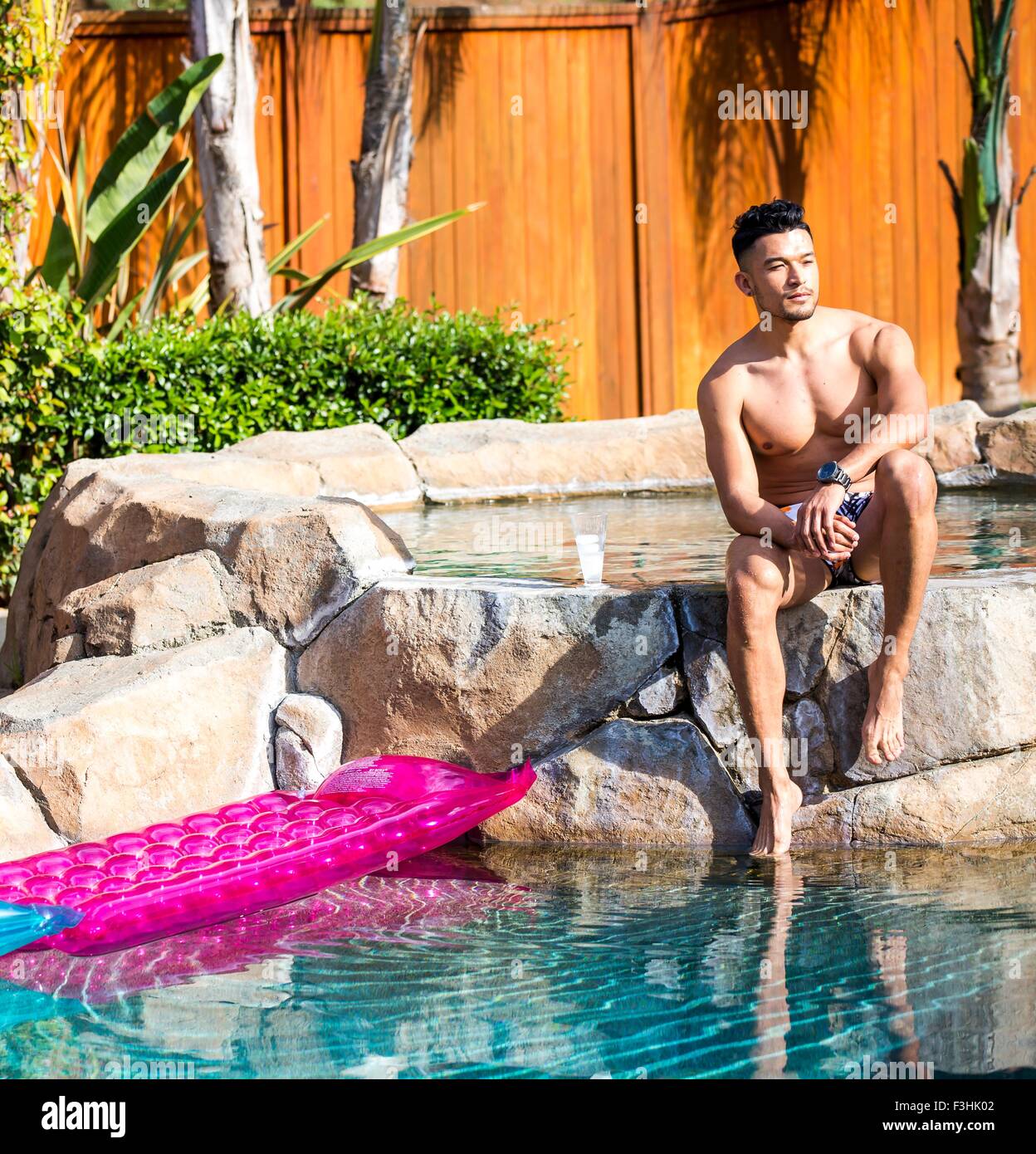 Sitting By Pool Rapper Garden swimming pool hi-res stock photography and images - Alamy
