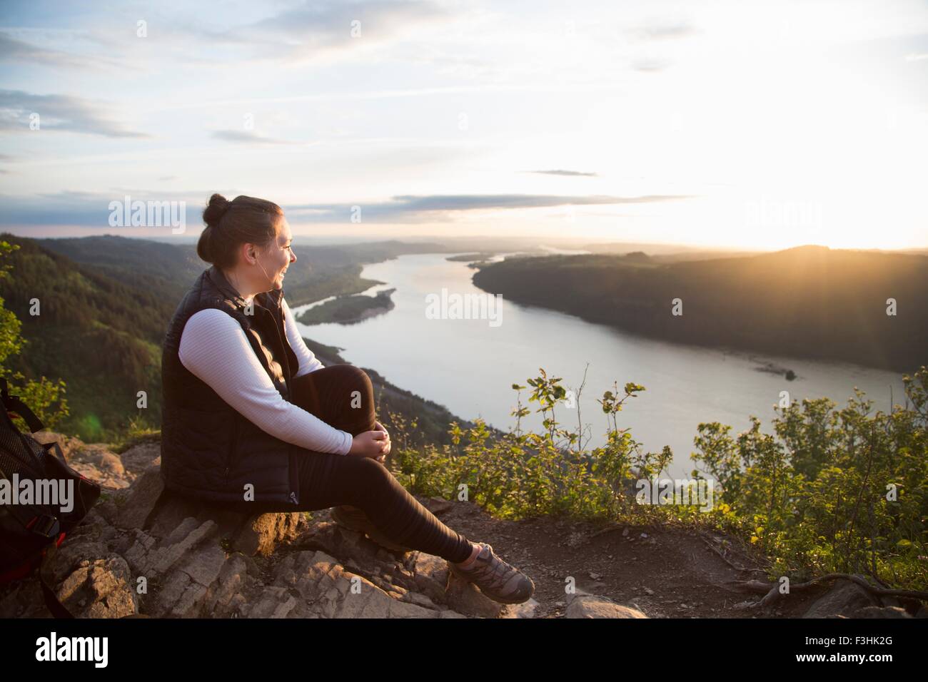 Woman enjoying view on hill, Angel's Rest, Columbia River Gorge, Oregon, USA Stock Photo