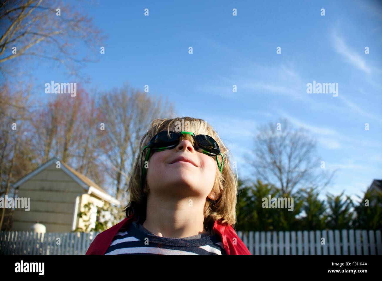 Boy in superhero goggles Stock Photo