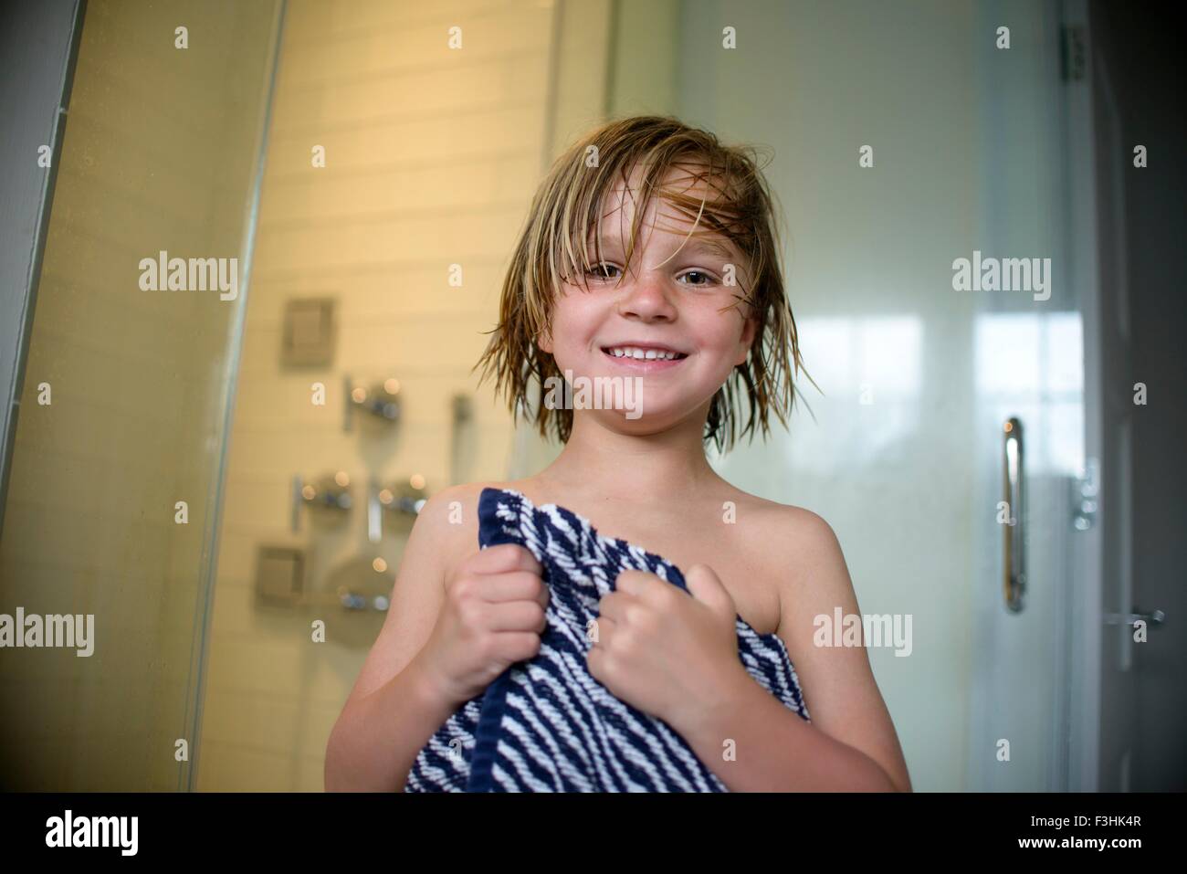 Boy after shower Stock Photo
