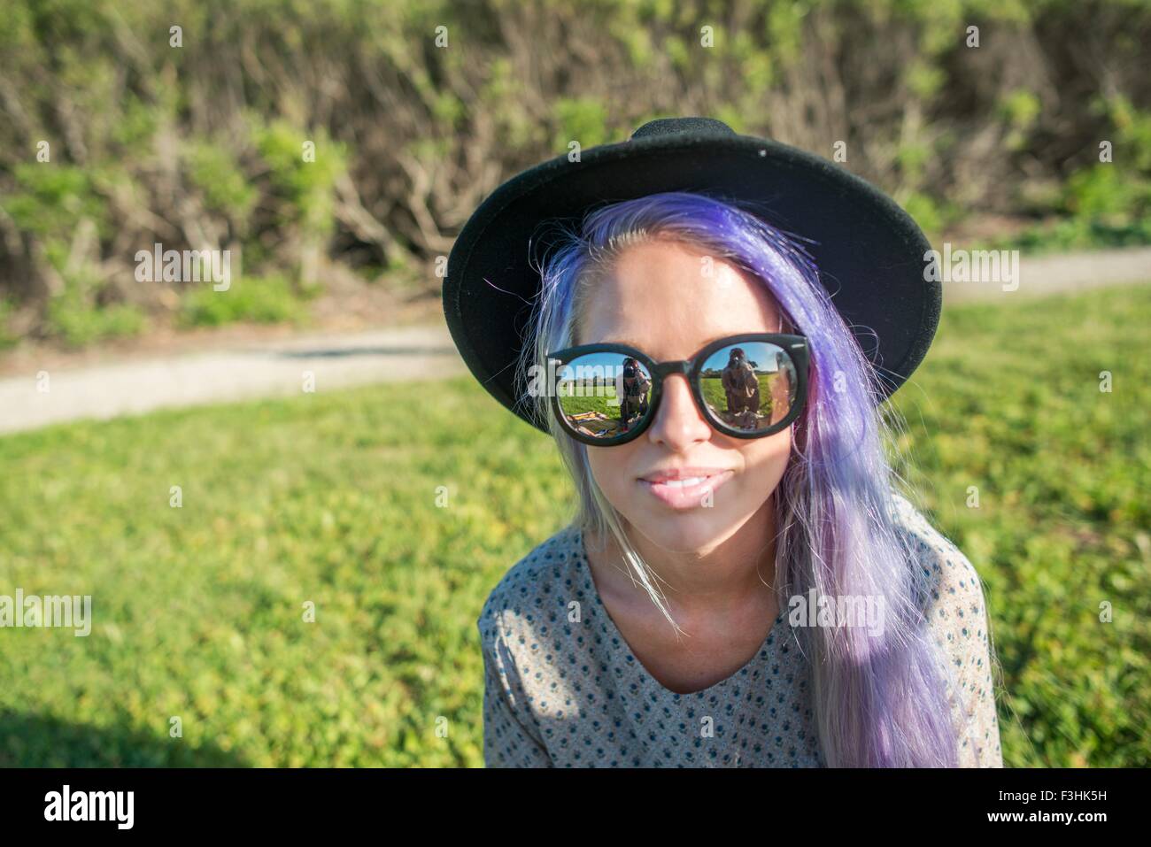 Woman with sun glasses and hat, El Capitan, California, USA Stock Photo