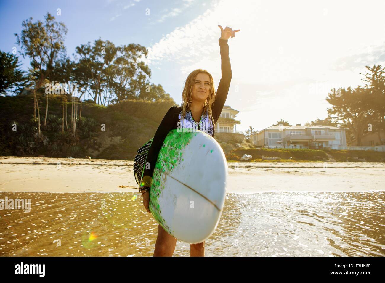 Woman standing sea raised arms hi-res stock photography and images - Alamy