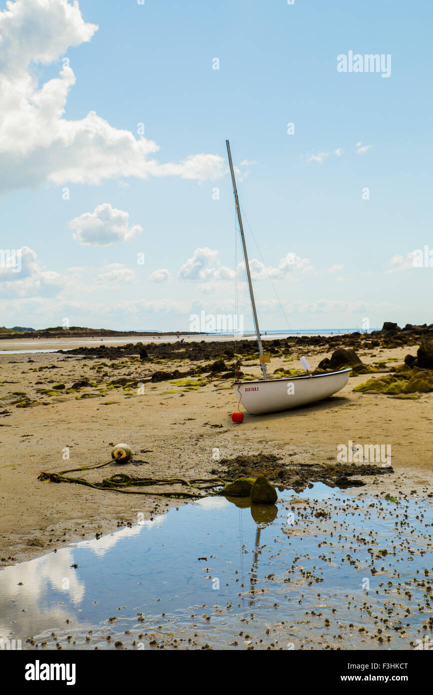 Boat on a beach in Carnac, Brittany. Stock Photo