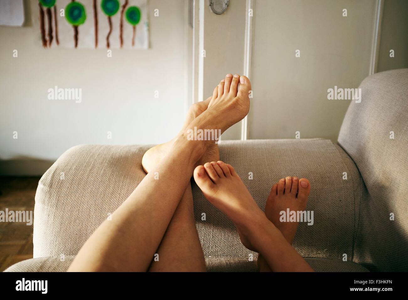 Older woman relaxing sofa hi-res stock photography and images - Alamy