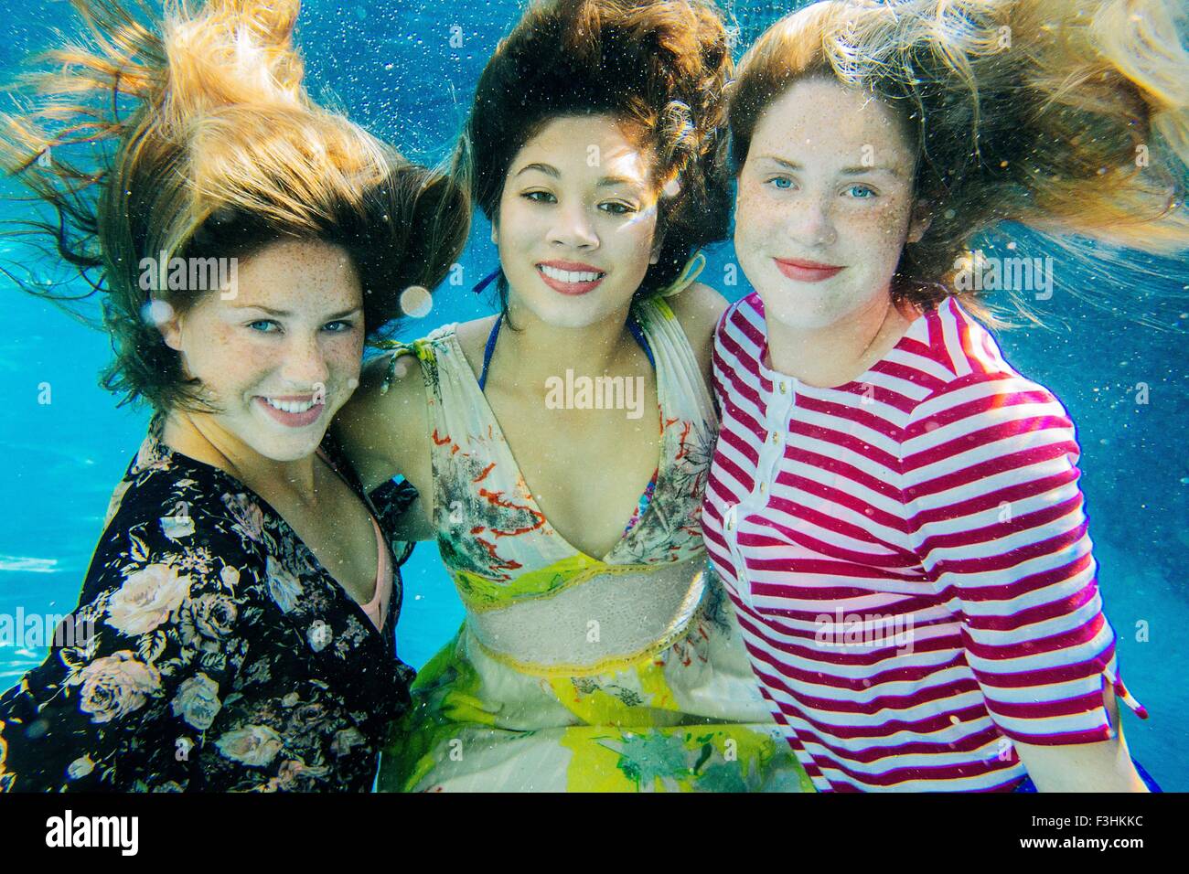 Portrait professional female swimmer smiling hi-res stock photography