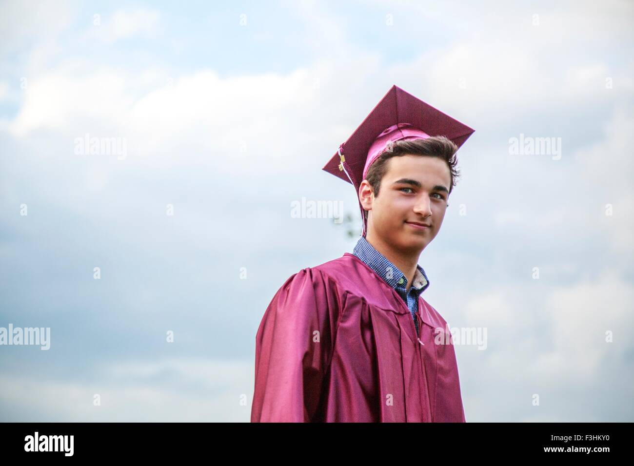 Portrait of young man at graduation ceremony Stock Photo
