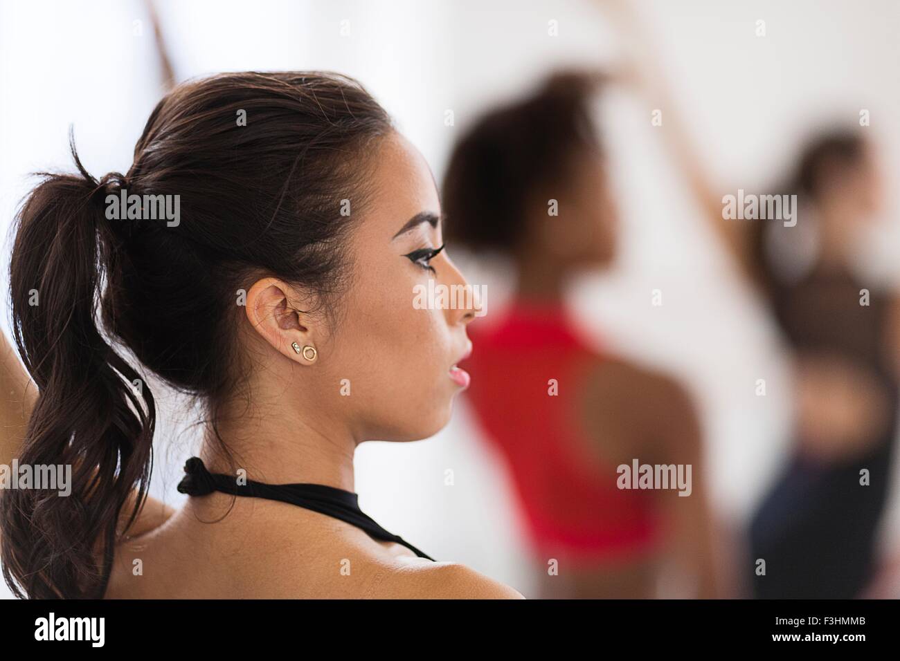 Side view of dancers head and shoulders looking away Stock Photo