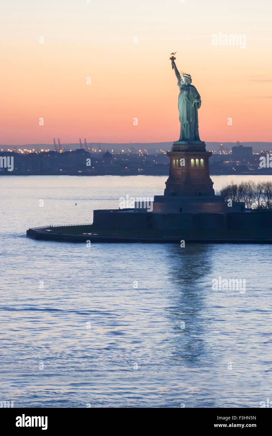 The Statue of Liberty at sunset in New York City, USA Stock Photo - Alamy
