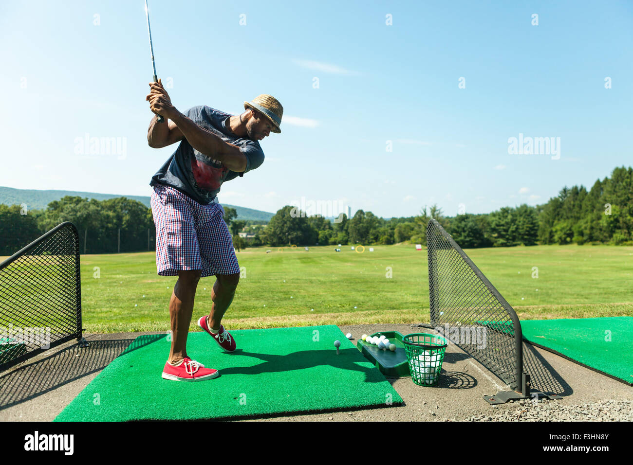 Golf Practice at the Driving Range Stock Photo