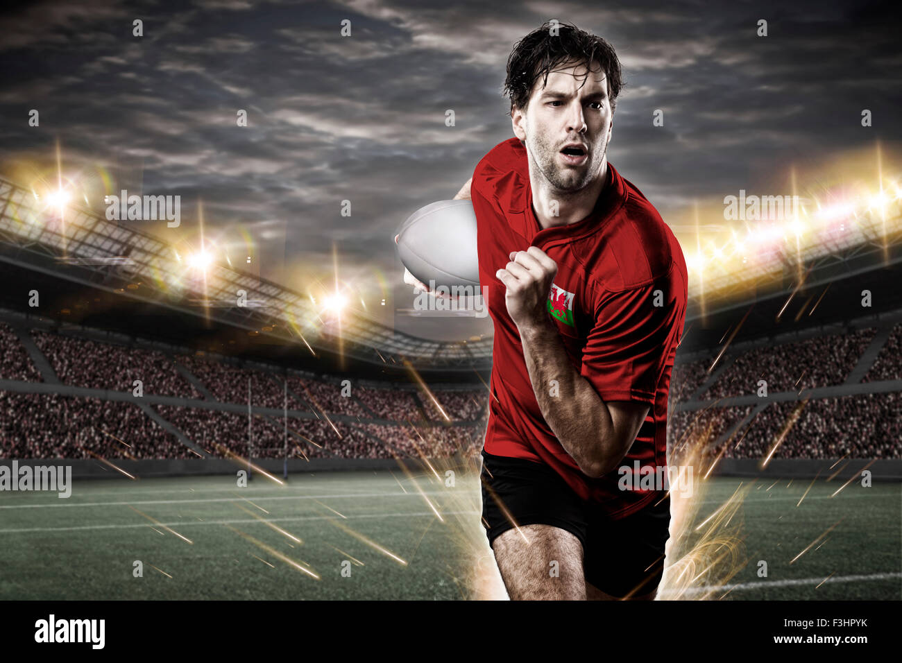 Welsh rugby player, wearing a red uniform in a stadium Stock Photo Alamy