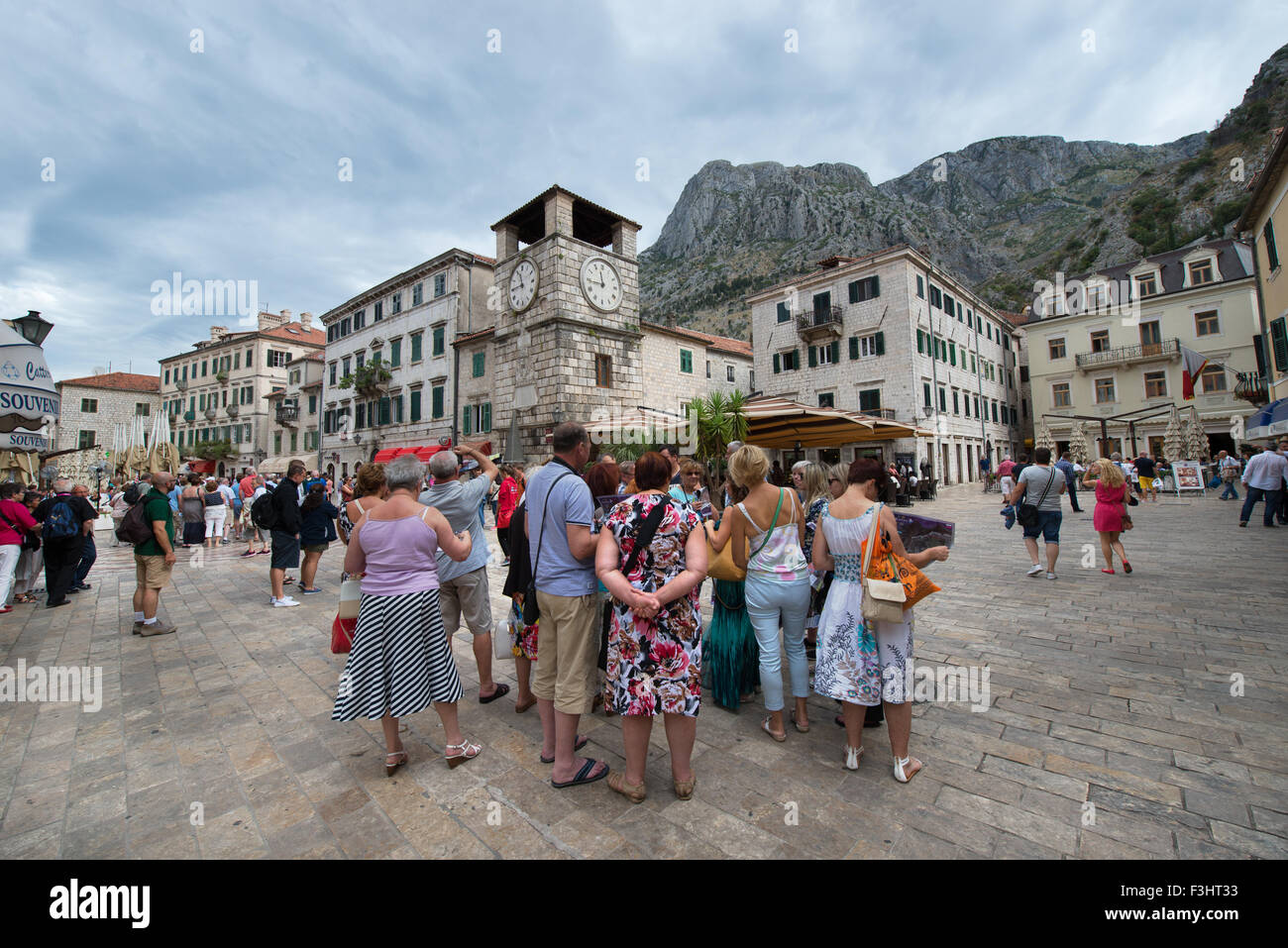 Tourists On Square Of Arms Under The Clock Tower Kotor Montenegro 