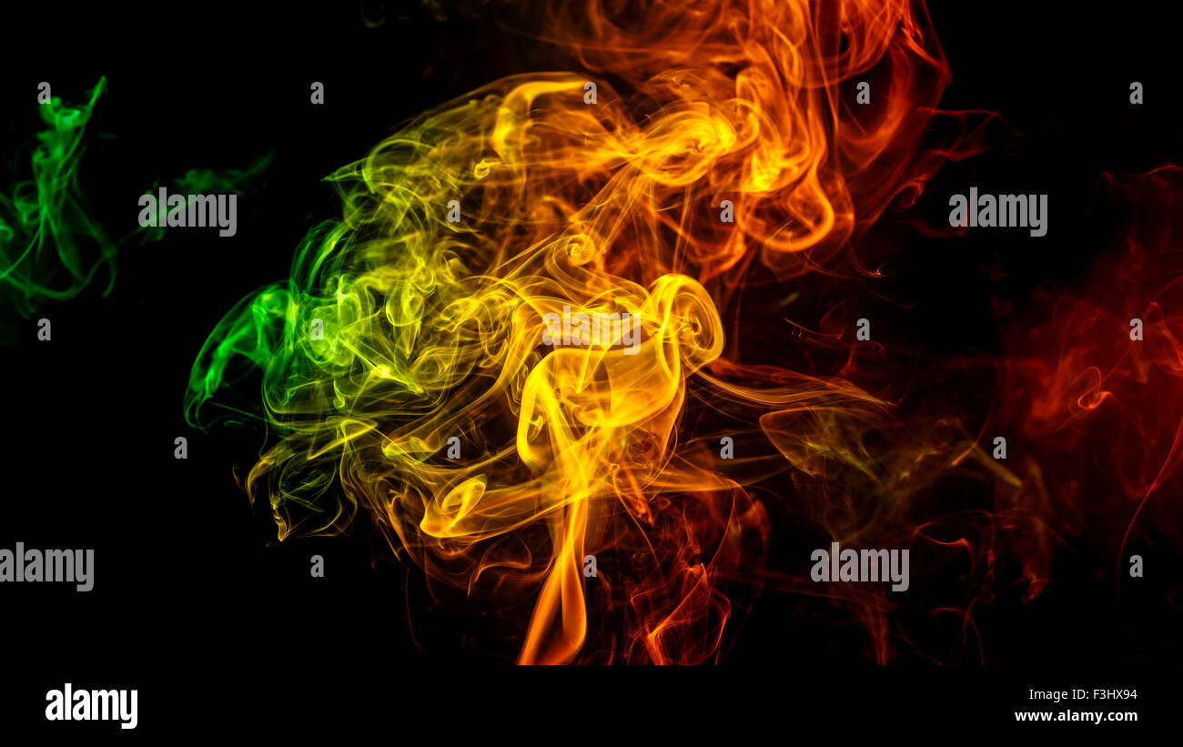 Abstract art. Color yellow - green - orange smoke from the aromatic