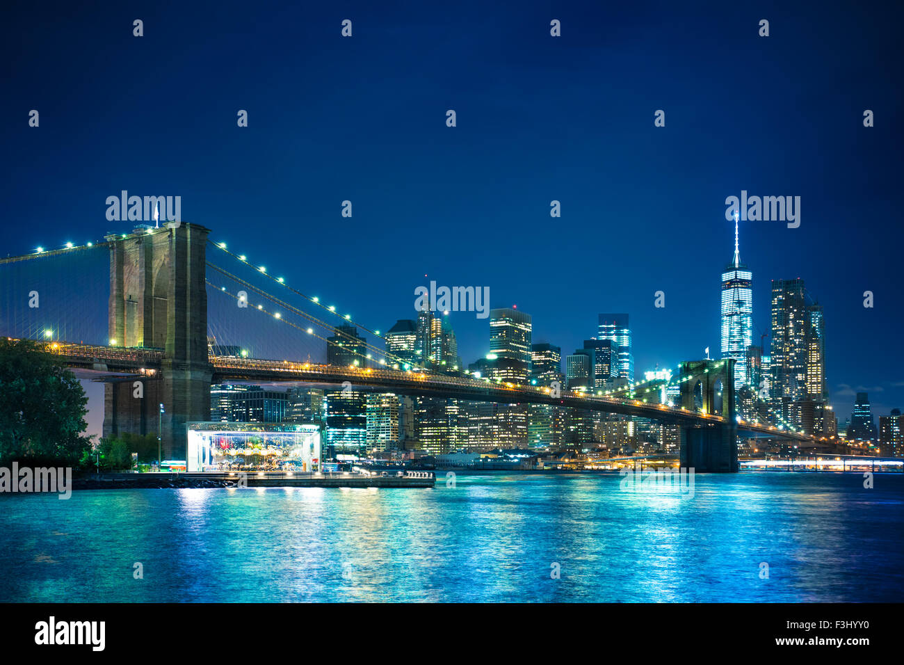 Beautiful night view of the Brooklyn Bridge looking towards Manhattan New York City Stock Photo