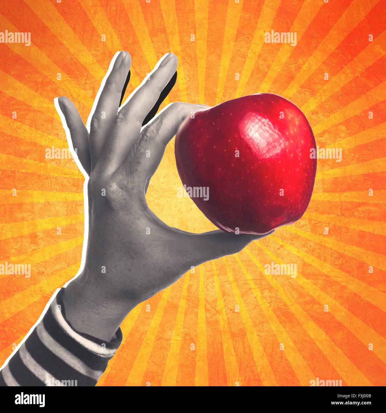 Healthy red delicious apple, retro collage image, woman holding tasty organic apple fruit. Stock Photo