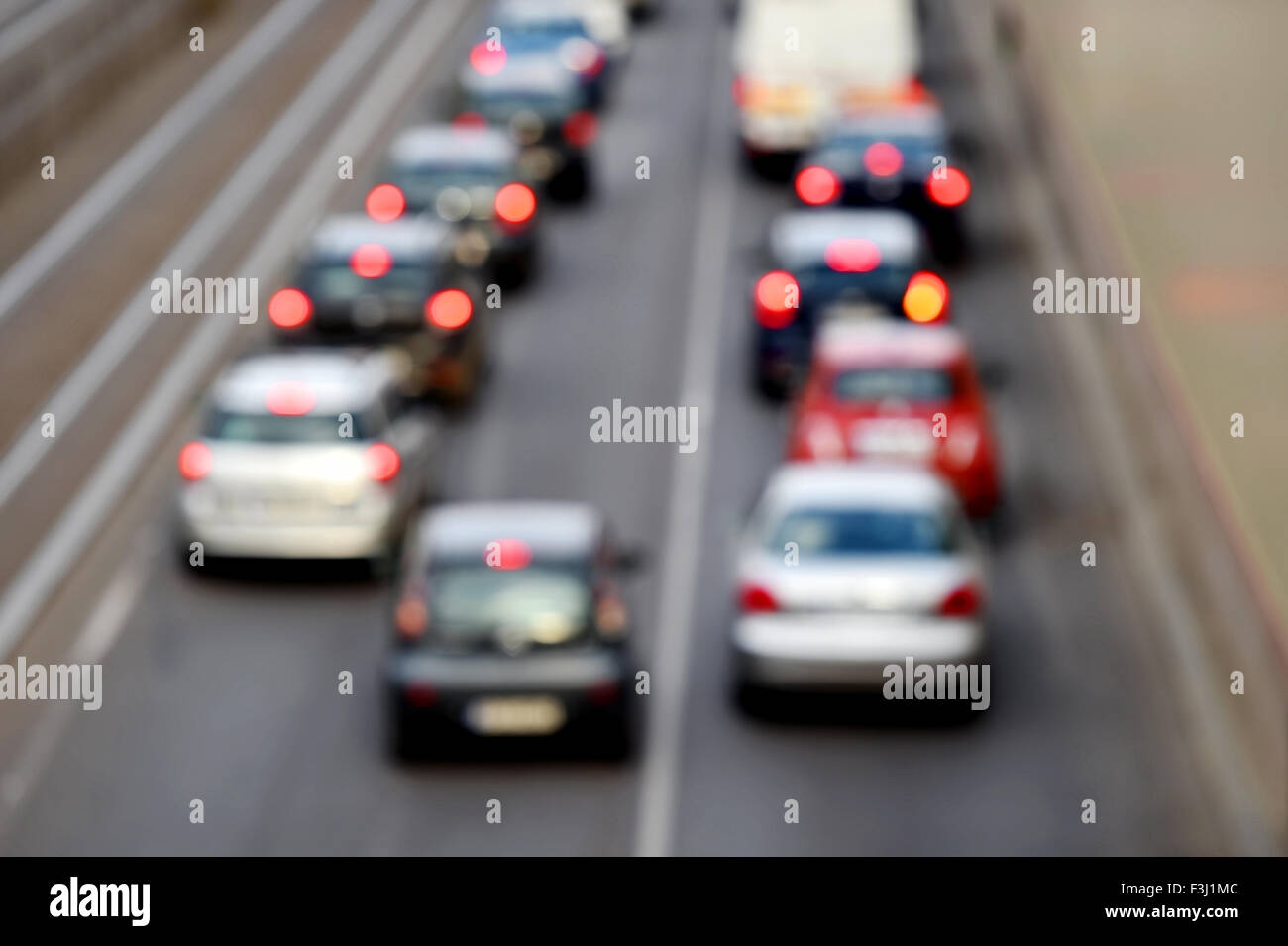 Blur shot of urban rush hour scene with multiple cars in a traffic congestion Stock Photo