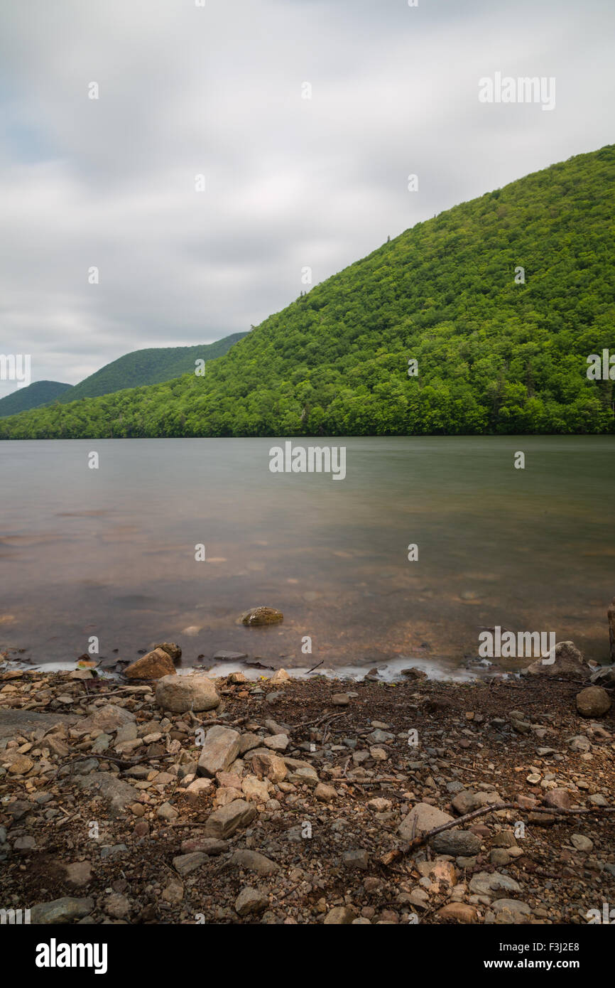 Hills and lakes in Cape Breton Island during the day taken with a long exposure Stock Photo