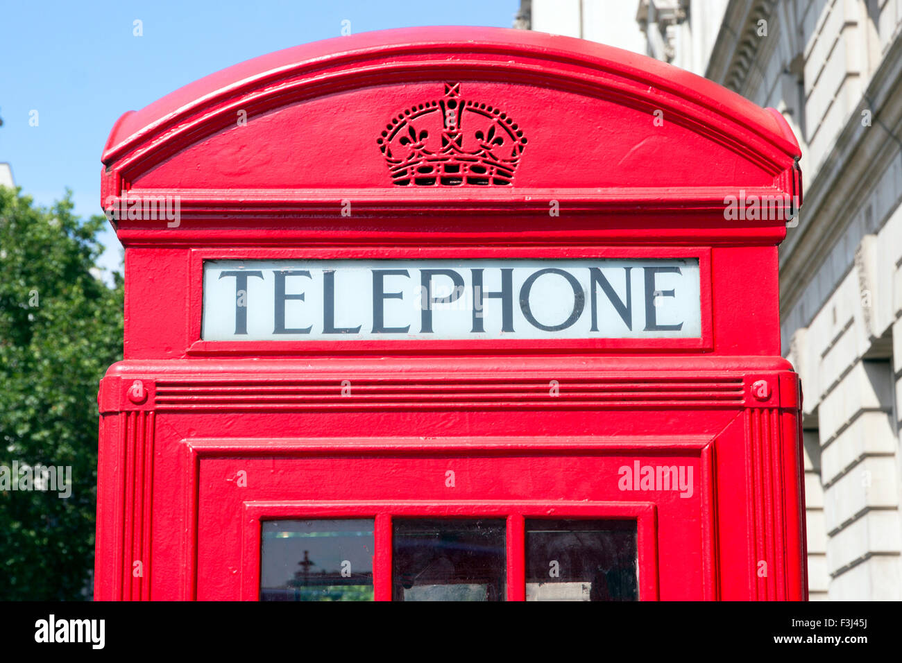 Traditional red telephone box in London Stock Photo