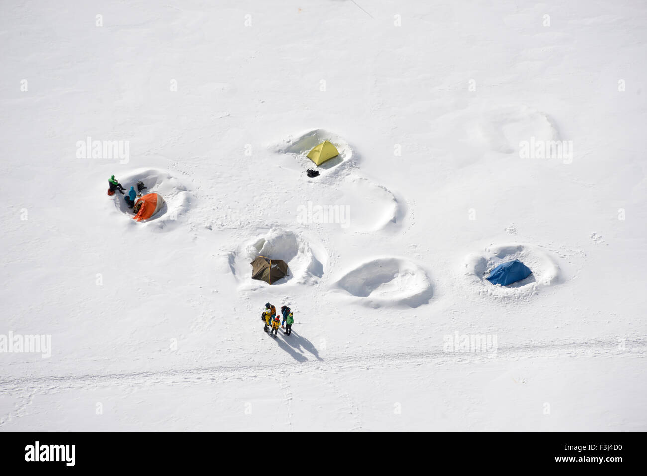 Mountaineers and climbers tents in the snow, Aiguille du Midi, Mont Blanc Massif, Chamonix, French Alps, Haute Savoie, France, E Stock Photo