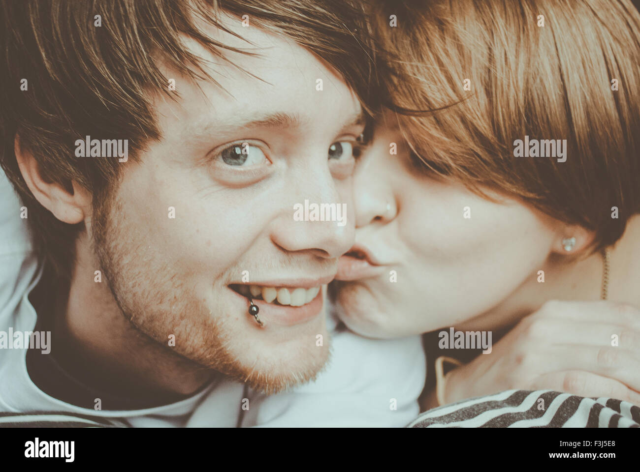 Cute young couple kissing, selfie Stock Photo Alamy