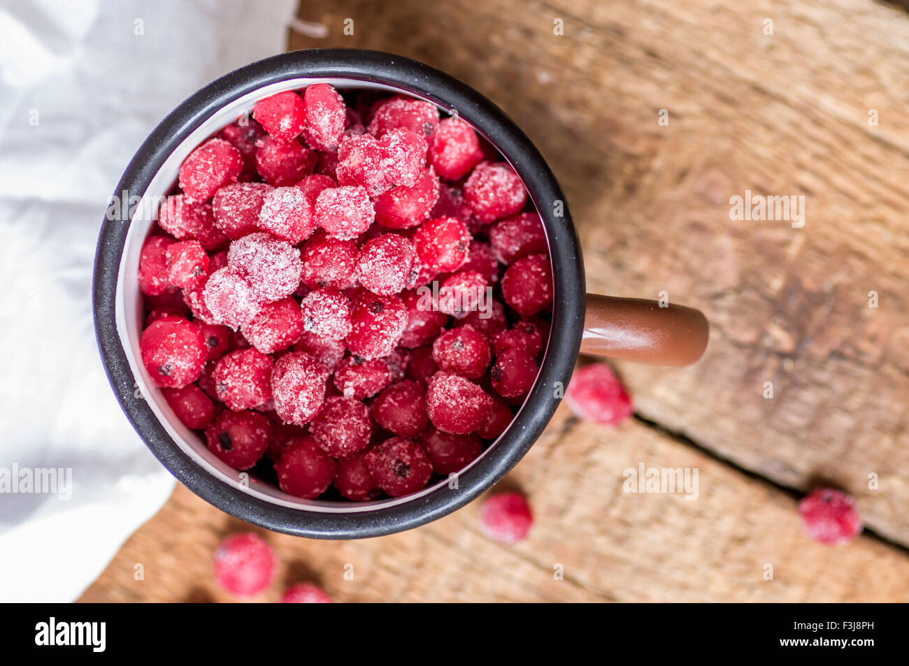 Red currant frozen in a mug top view Stock Photo
