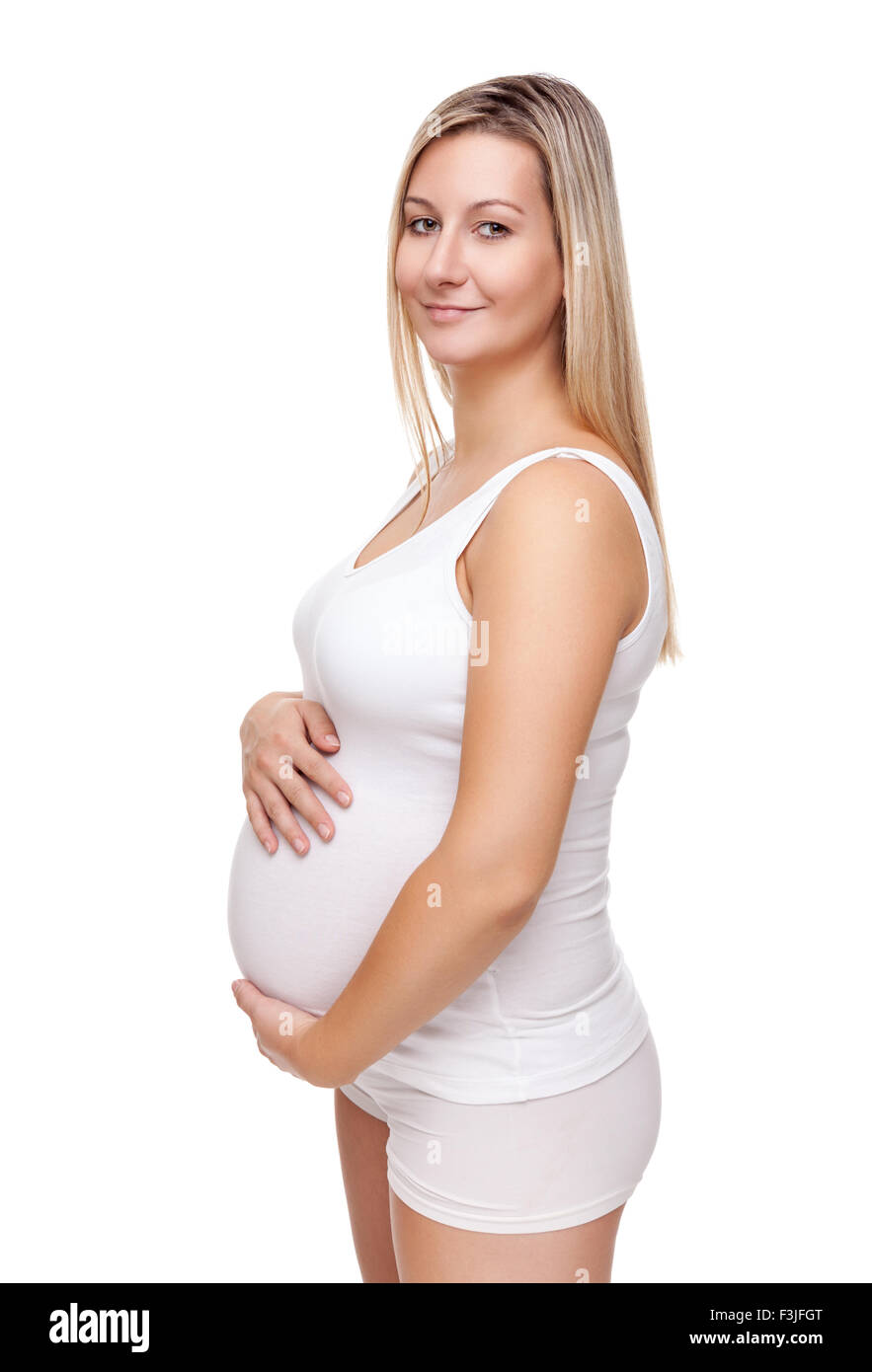 Portrait of a pregnant woman holding her belly Stock Photo - Alamy