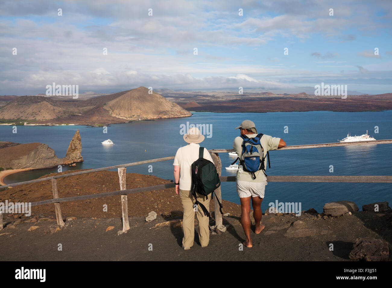 Admiring the landscape of Isla Bartolome the classic beauty spot of the Galapagos, Ecuador in September Stock Photo