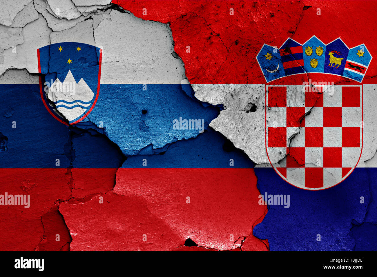 flags of Slovenia and Croatia painted on cracked wall Stock Photo - Alamy