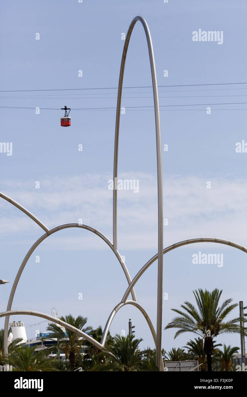 Cable car over the Onades (Waves) sculpture by Andreu Alfaro. Barcelona Stock Photo