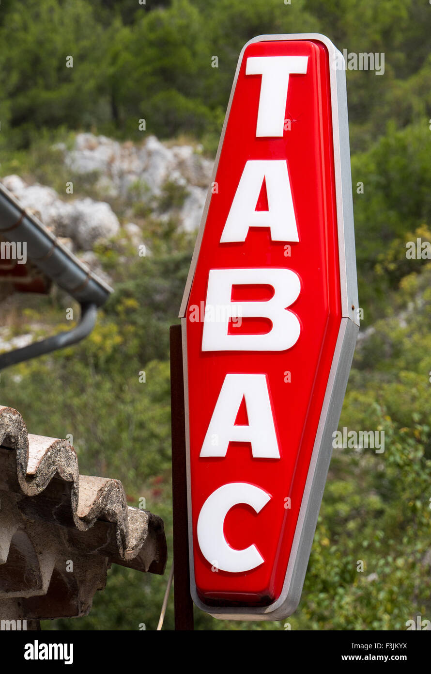 A 'TABAC' sign in Vaucluse, Southern France.  A Tabac is a shop licensed to sell tobacco products in France. Stock Photo