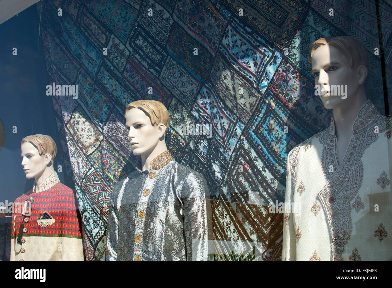 Clothing and fabrics shop window in Stratford Road, Sparkhill, Birmingham, West Midlands, UK