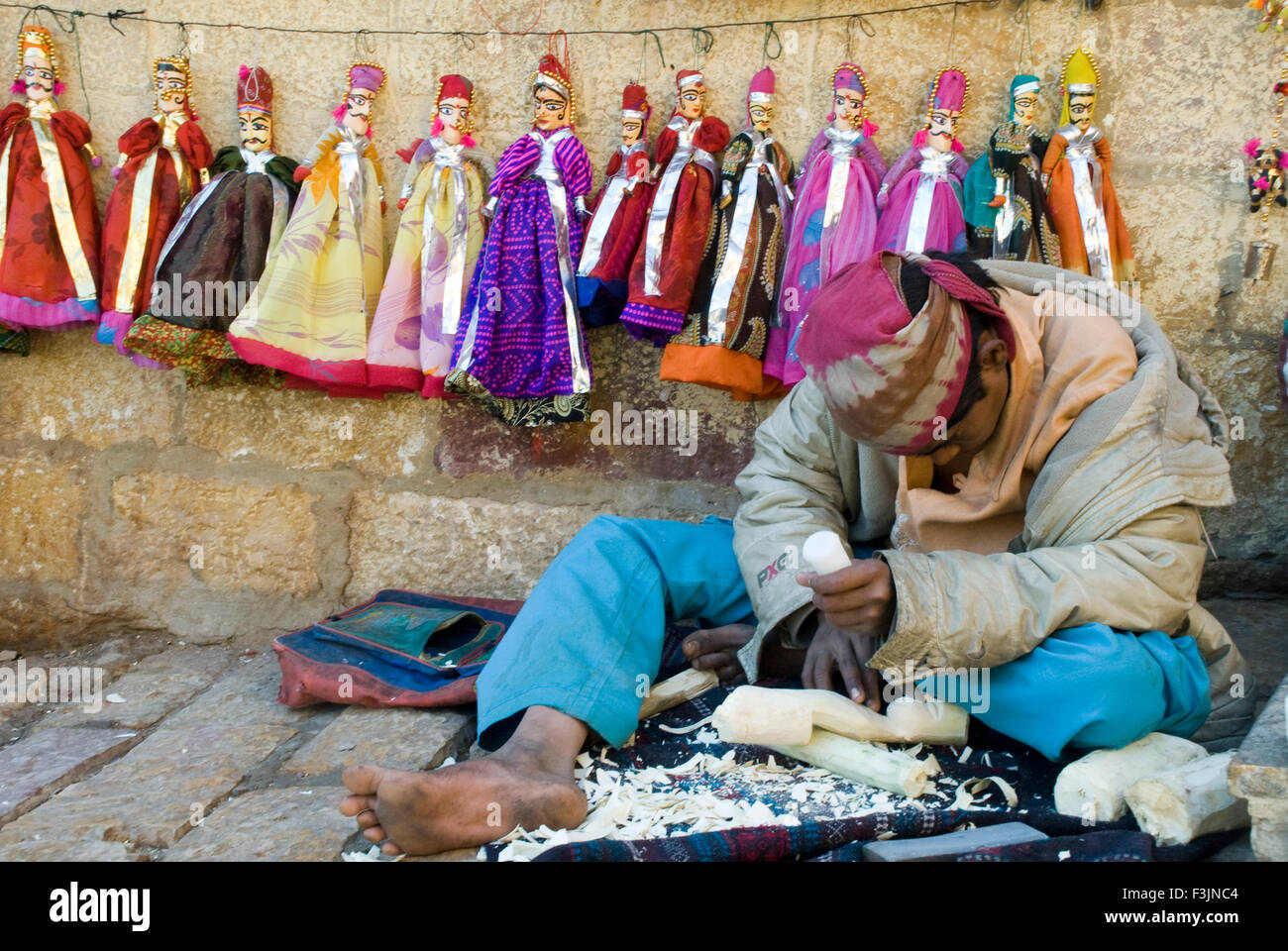 Puppet making at market shop at Jaisalmer ; Rajasthan ; India Stock