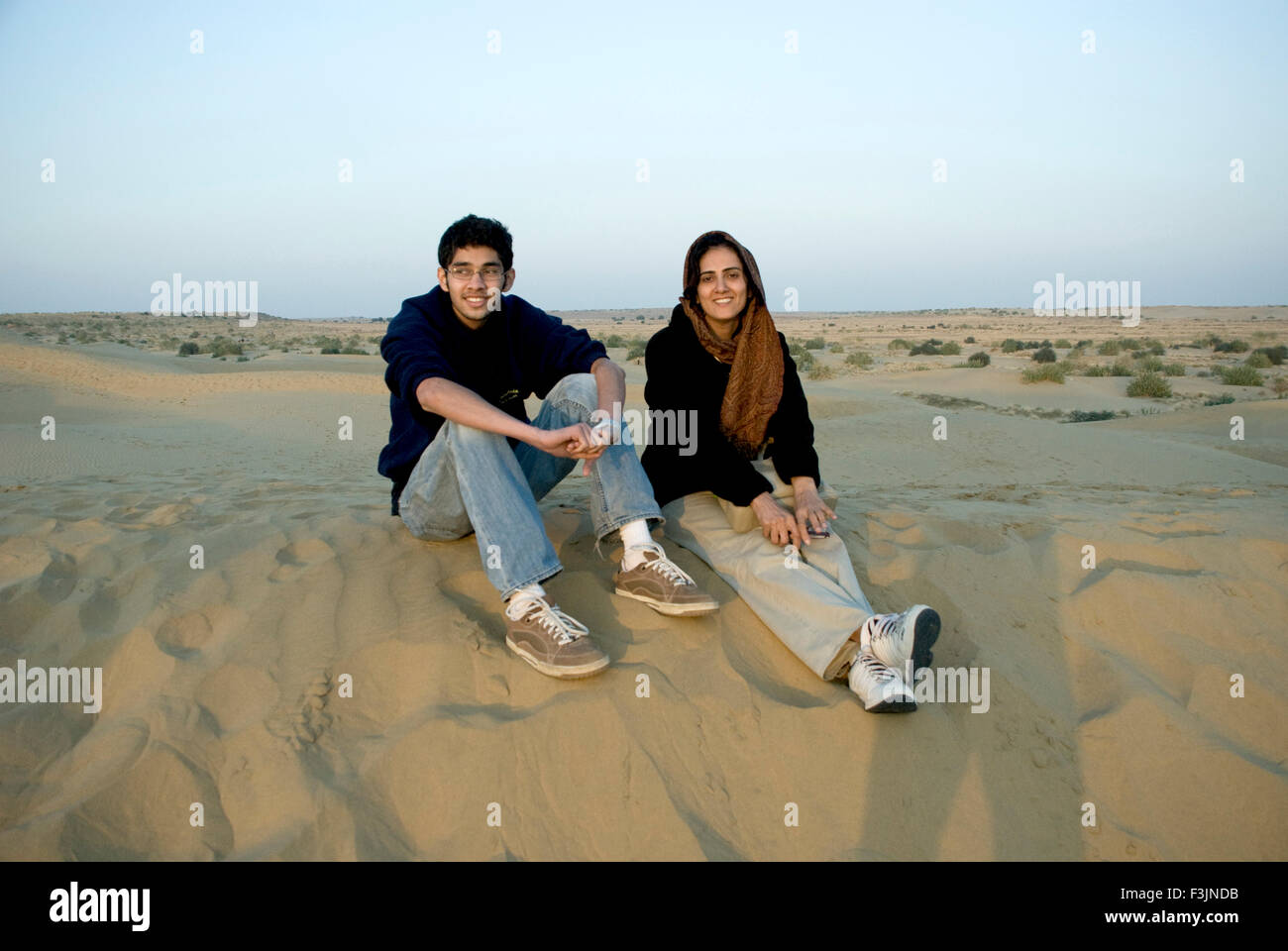 Mother & son at sam sand dunes at Jaisalmer ; Rajasthan ; India NO MR Stock Photo