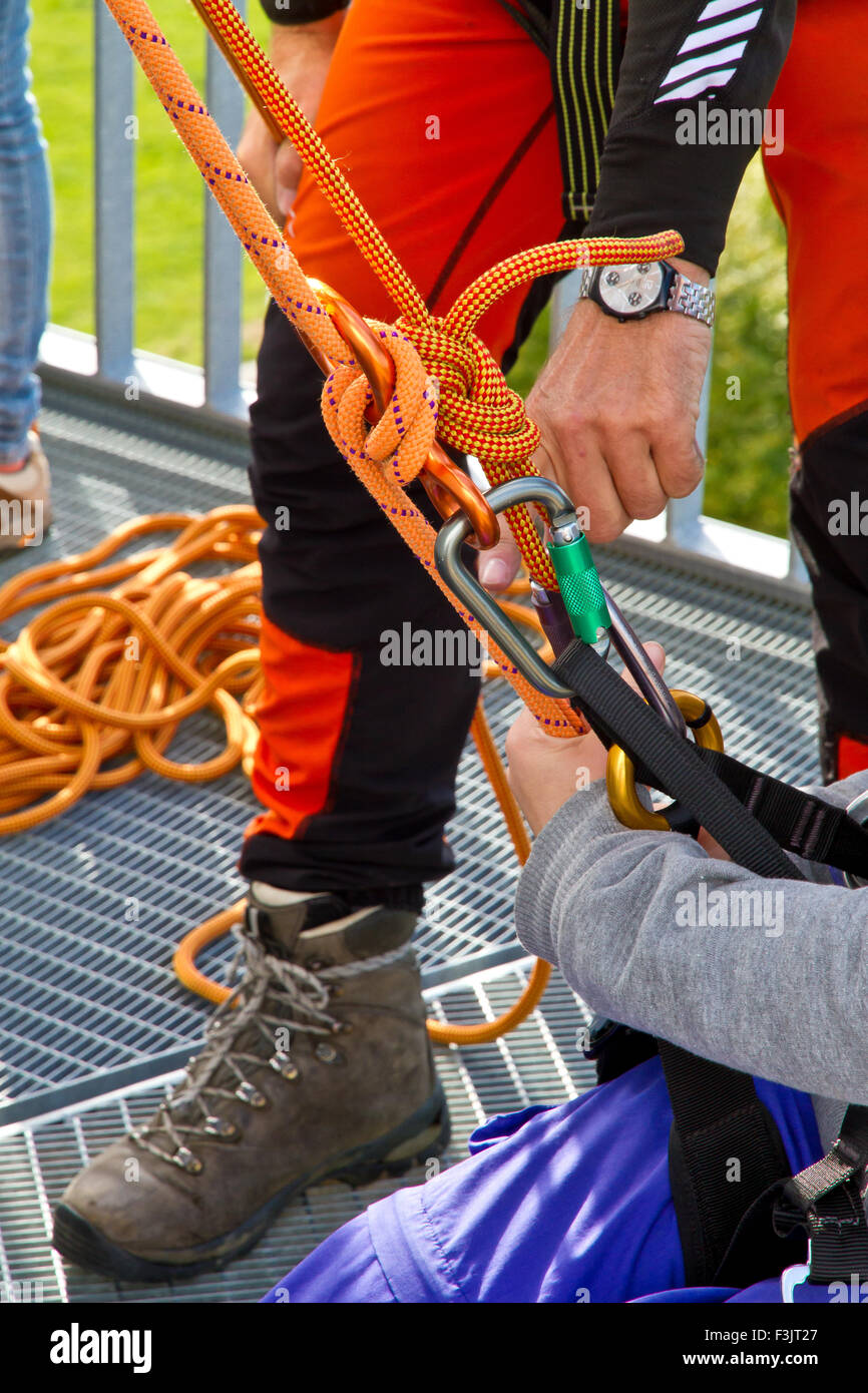 People practice climbing on a tower Stock Photo Alamy