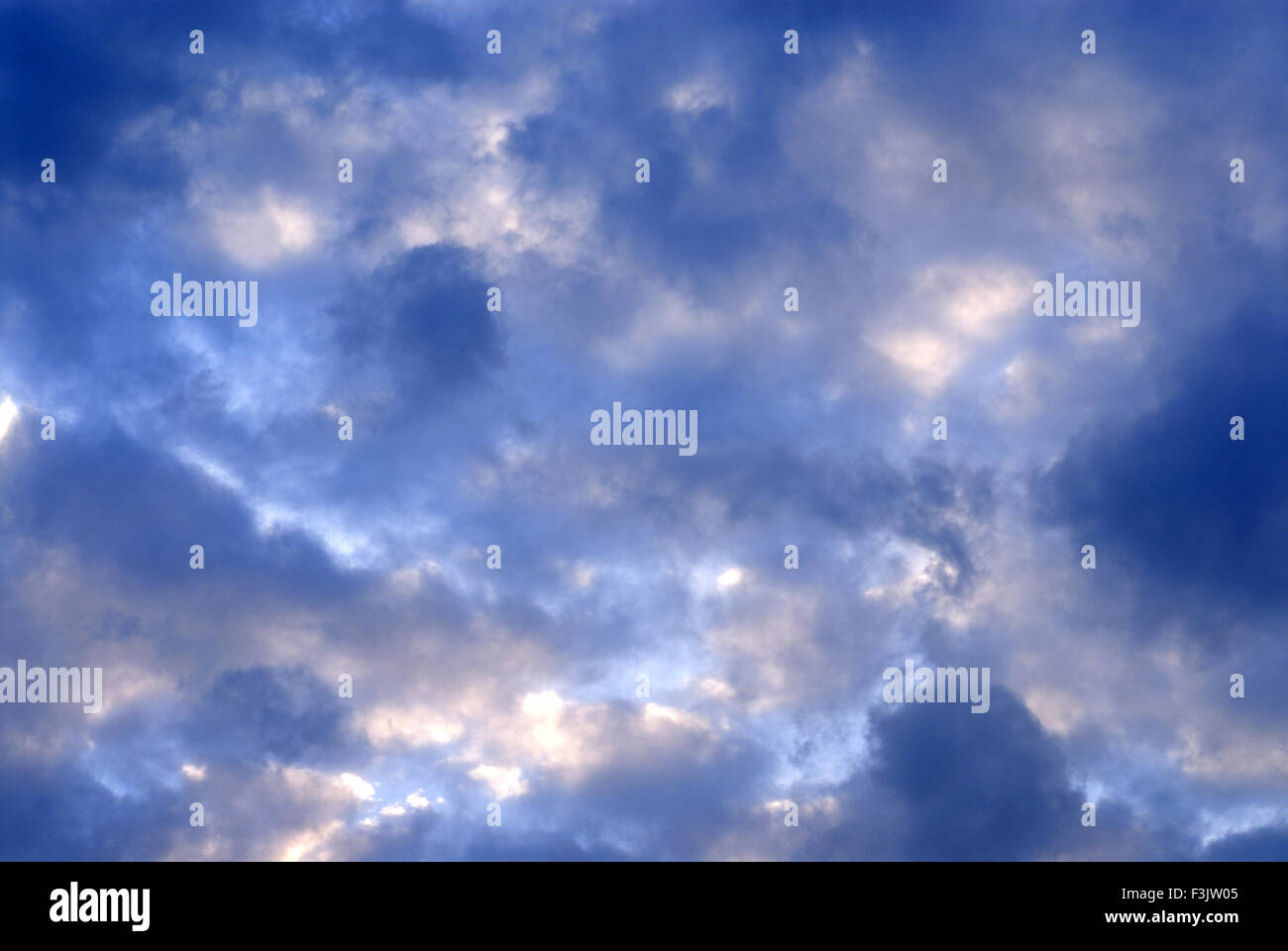 Blue Sky Grey and white clouds Stock Photo