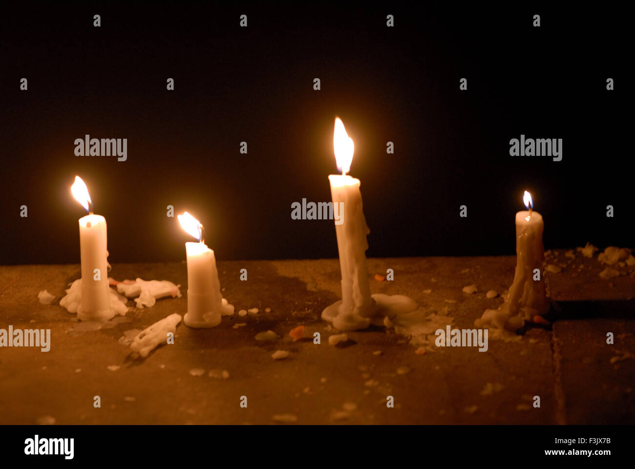 Candles of wax illuminated for celebrating Gudi Padva Festival ; New